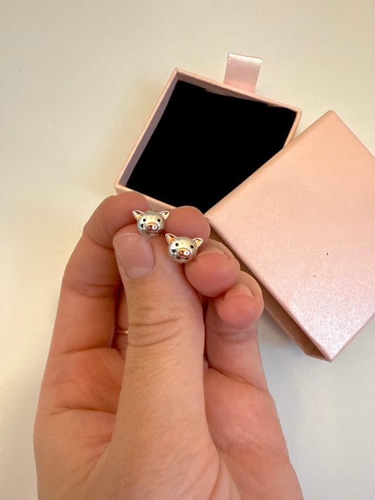 Pig stud earrings