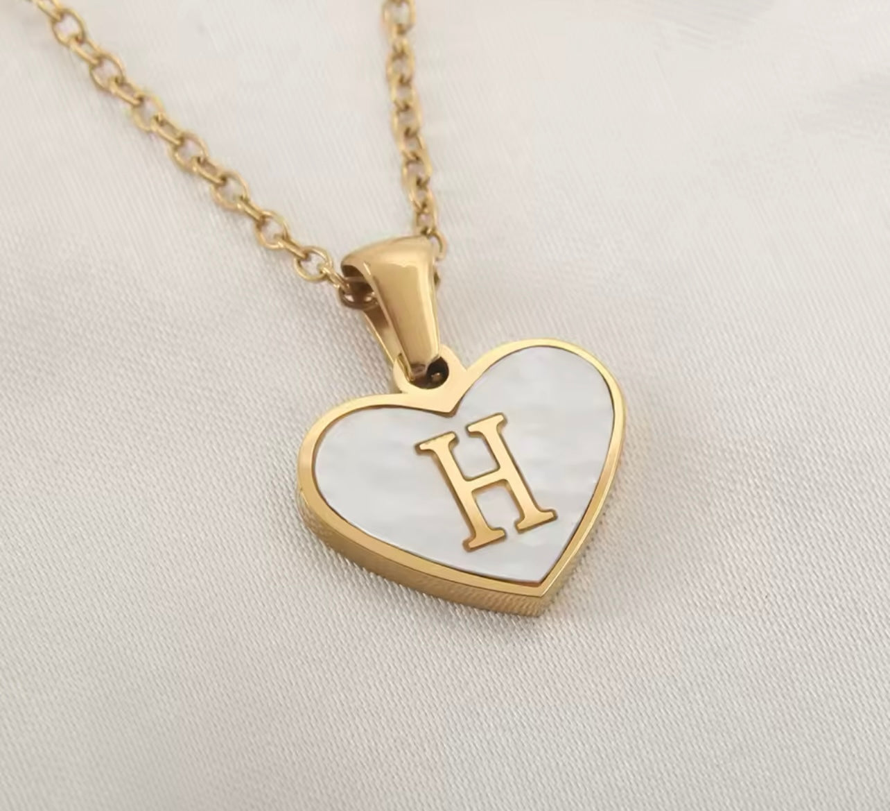 Golden heart initial necklace