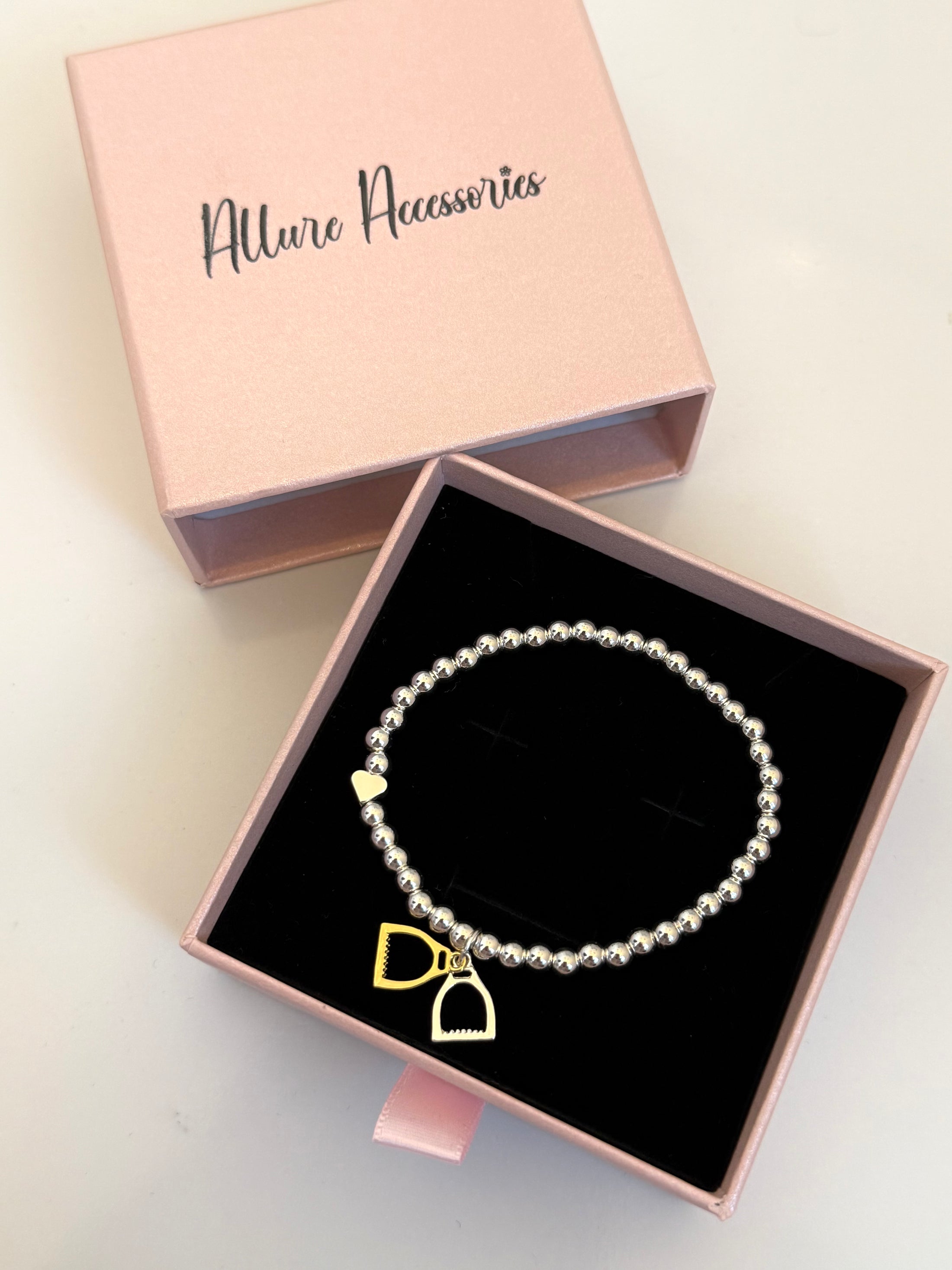 Two tone beaded stirrup bracelet