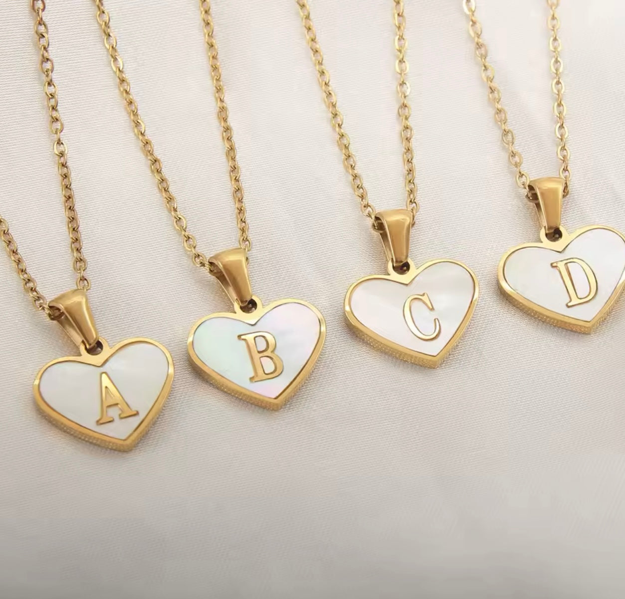 Golden heart initial necklace